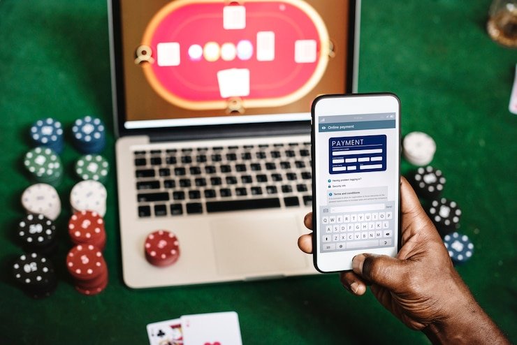 raja jeus Olympic Games interface displayed on mobile phone showing live-dealer table and slot options